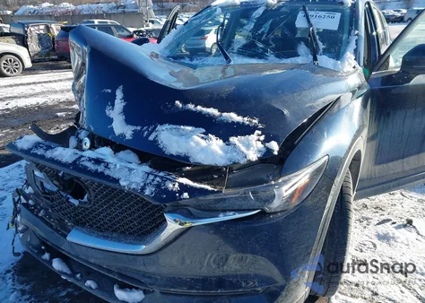 2021 Mazda Cx-5 Grand Touring z USA, uszkodzony, nr VIN JM3KFBDM2M1325837